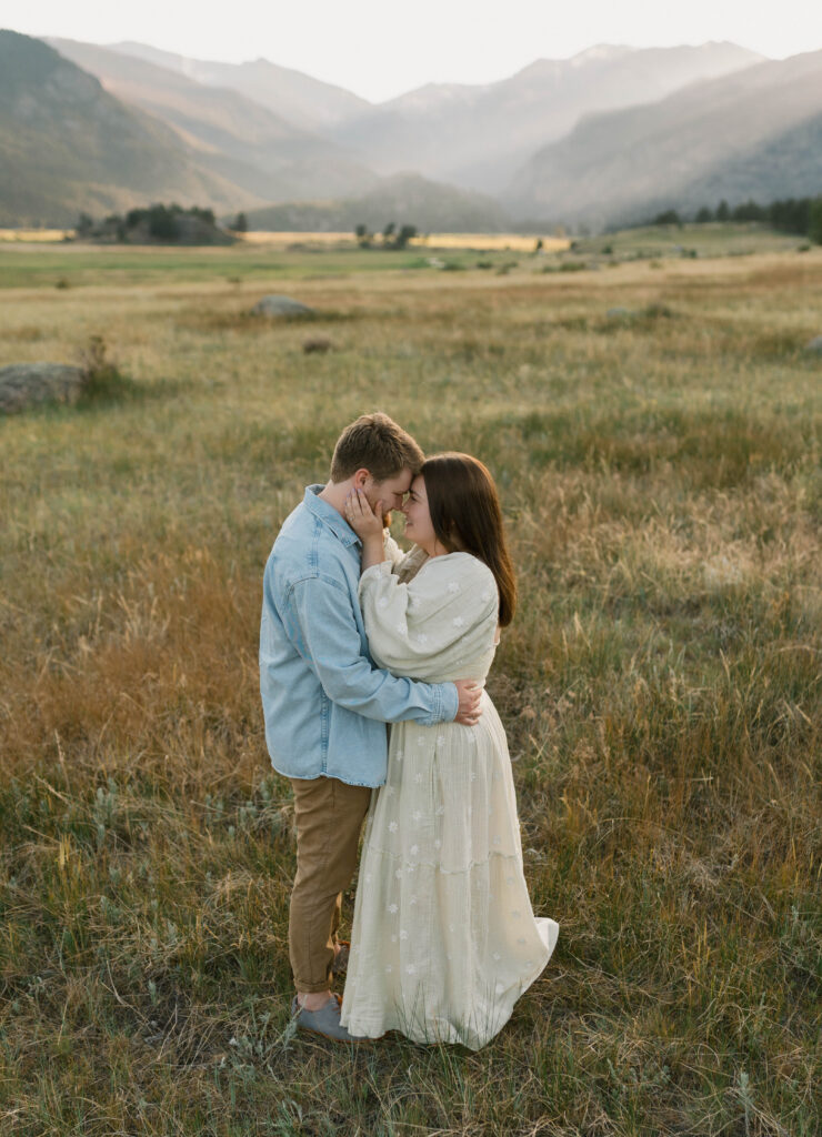 A couple kisses at the Moraine Open Space inside Rocky Mountain National Park for their elopement near Estes Park, Colorado 
