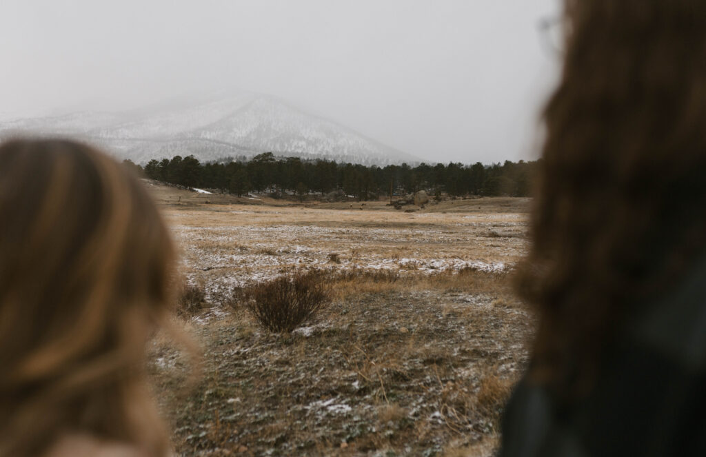 A snowy engagement session at Moraine Park in Rocky Mountain National Park. Engagement photo locations in Estes Park, Colorado. 
