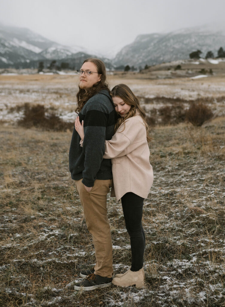 A dreamy engagement session during a spring snow storm at Moraine Park in Rocky Mountain National Park. Candid and documentary engagement photos in Estes Park, Colorado. 
