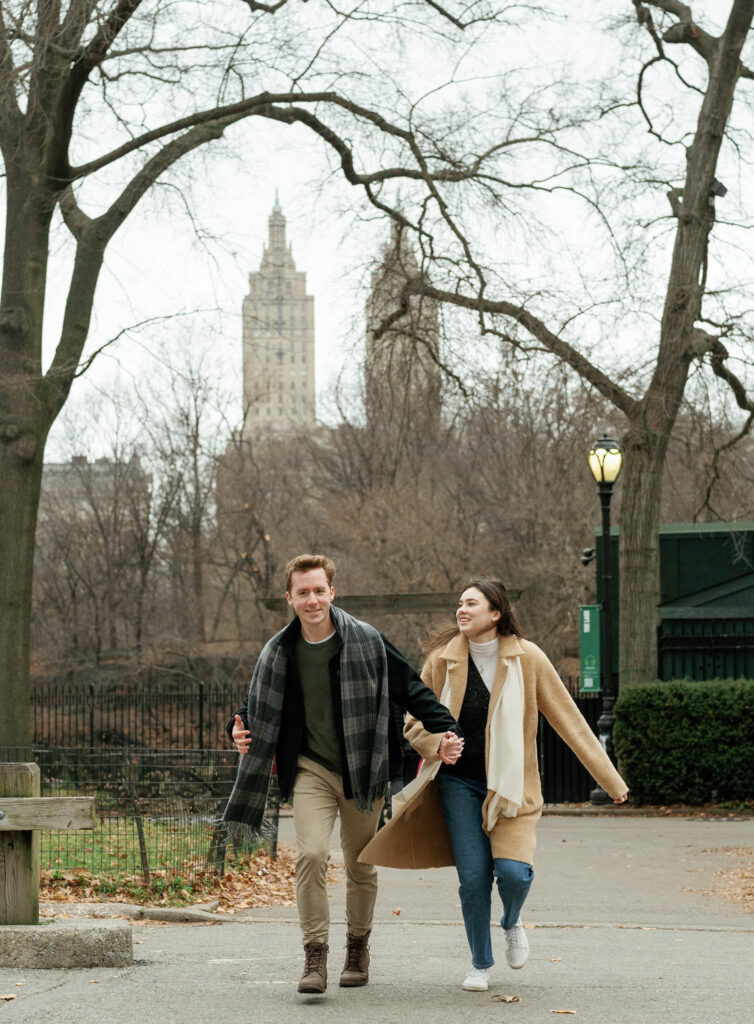 A couple wandering around Central Park together. Discover candid engagement photos in New York City. 