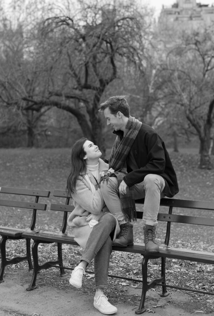 A couple sitting in Central Park together. Discover candid couples photos in New York City. 
