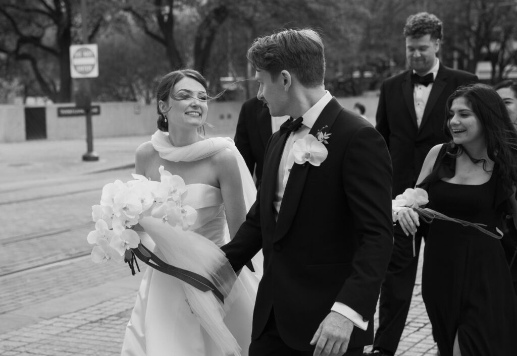 A classic and timeless bride and groom at their downtown Dallas, Texas wedding at the 400 N Ervay wedding venue. Discover candid, editorial and documentary wedding photography on digital and film. 