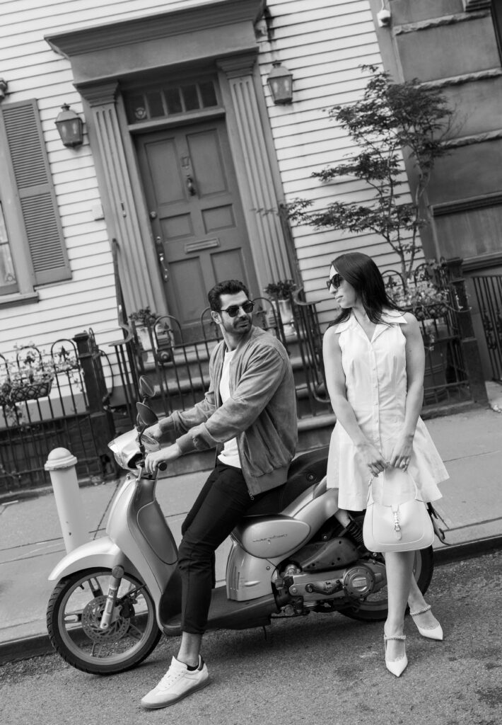 A scooter engagement session with a couple in the West Village in New York City. Discover documentary engagement photography in NYC 