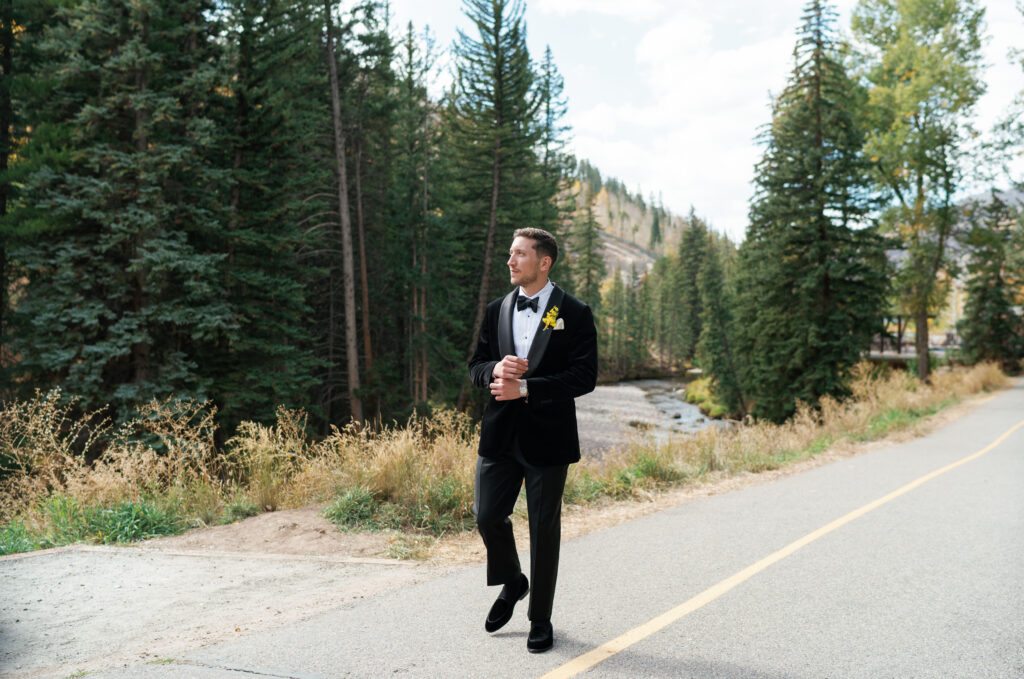 A modern groom poses for his wedding in Vail. Discover luxury editorial wedding photography in Colorado and beyond.  