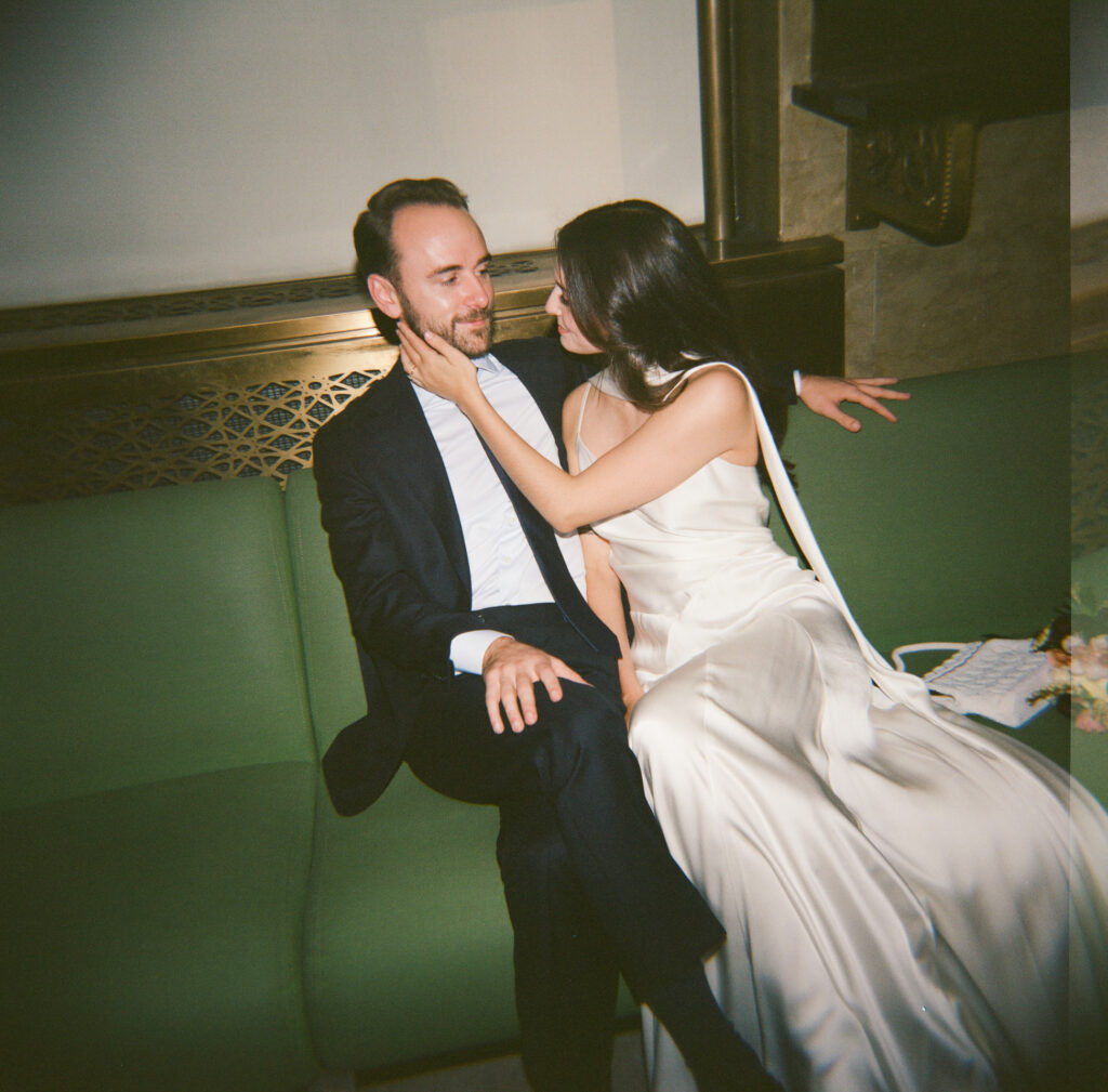A couple in Manhattan City Hall for their New York City courthouse elopement. Discover a documentary and editorial film wedding photographer in New York City.
