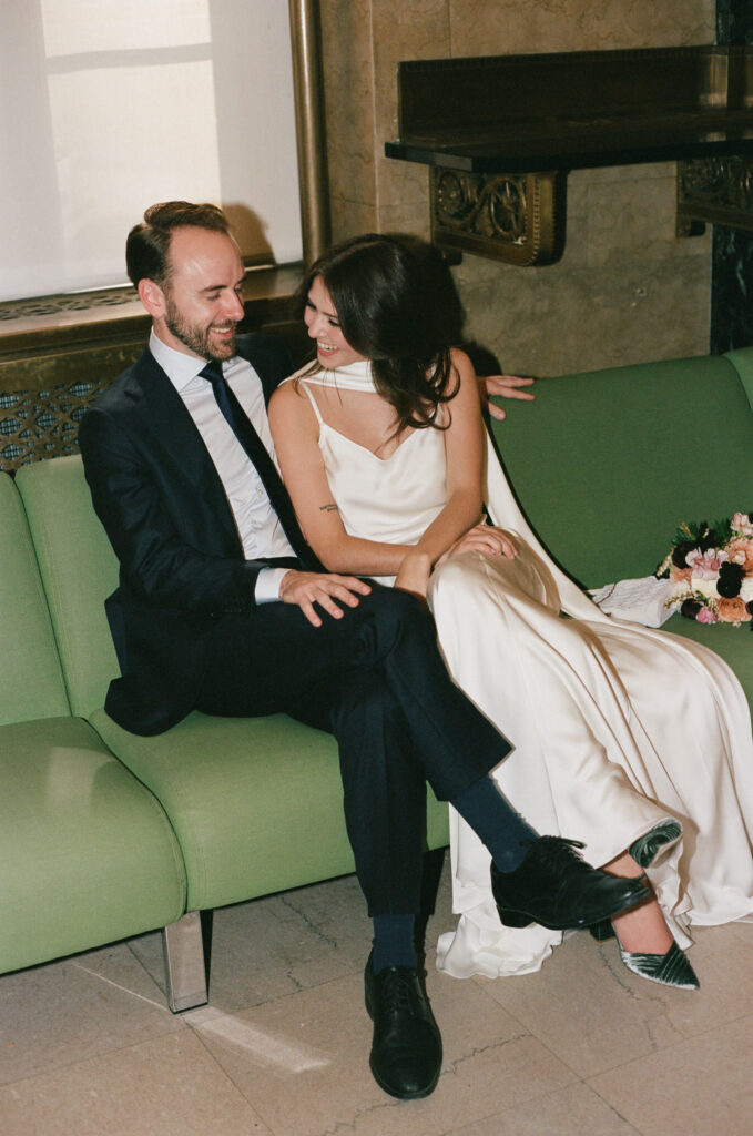 A couple in Manhattan City Hall for their New York City courthouse elopement. Discover a documentary and editorial film wedding photographer in New York City.