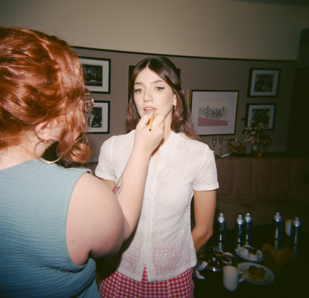 A bride gets ready for her wedding day in downtown Los Angeles, California. Discover film wedding photography in New York, Colorado, and California. 