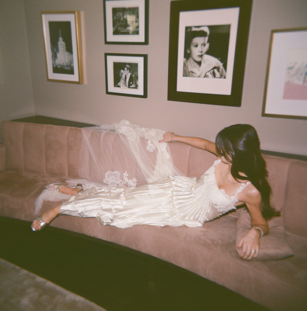 A bride gets ready for her wedding day in downtown Los Angeles, California. Discover film wedding photography in New York, Colorado, and California. 