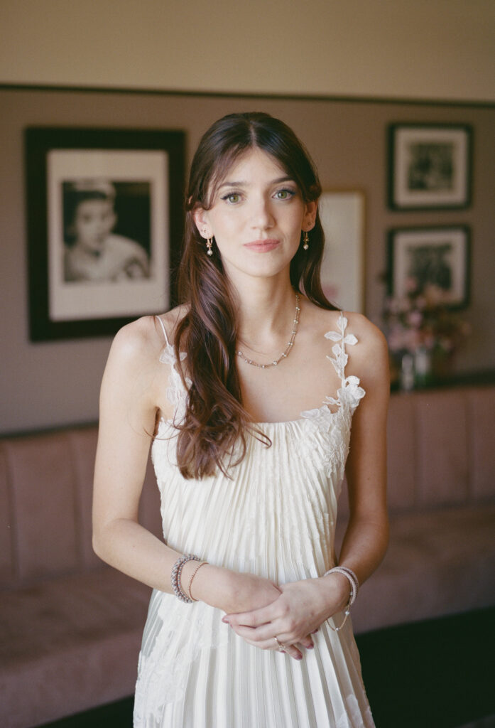 A bride poses for her wedding day in downtown Los Angeles, California. Discover film wedding photography in New York, Colorado, and California. 