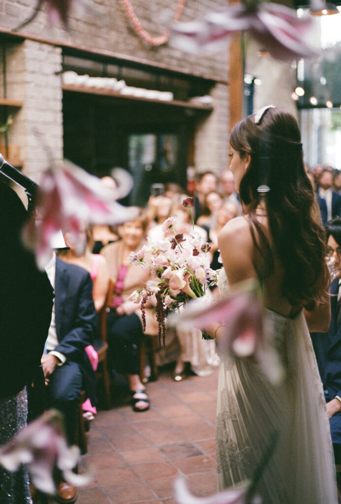 A wedding ceremony in downtown Los Angeles, California. Discover film wedding photography in New York, Colorado, and California. 